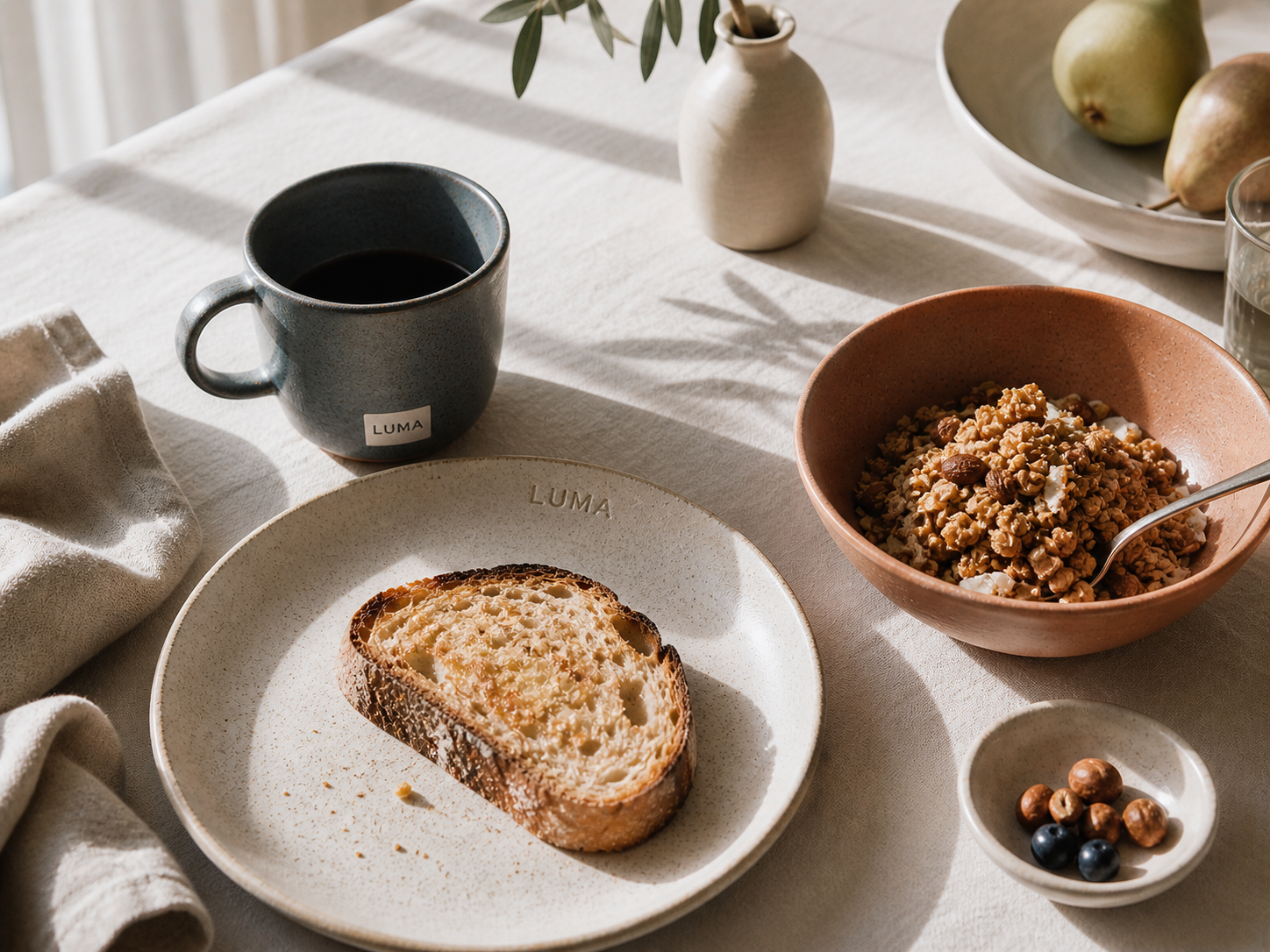 LUMA campaign hero — table in morning light